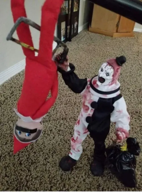 Crazy clown with saw Elf On The Shelf scene
