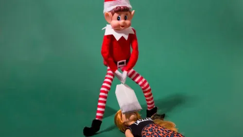 Elf On The Shelf teabagging woman with an actual teabag