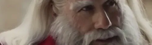 John Travolta become Santa Claus in new Christmas ad